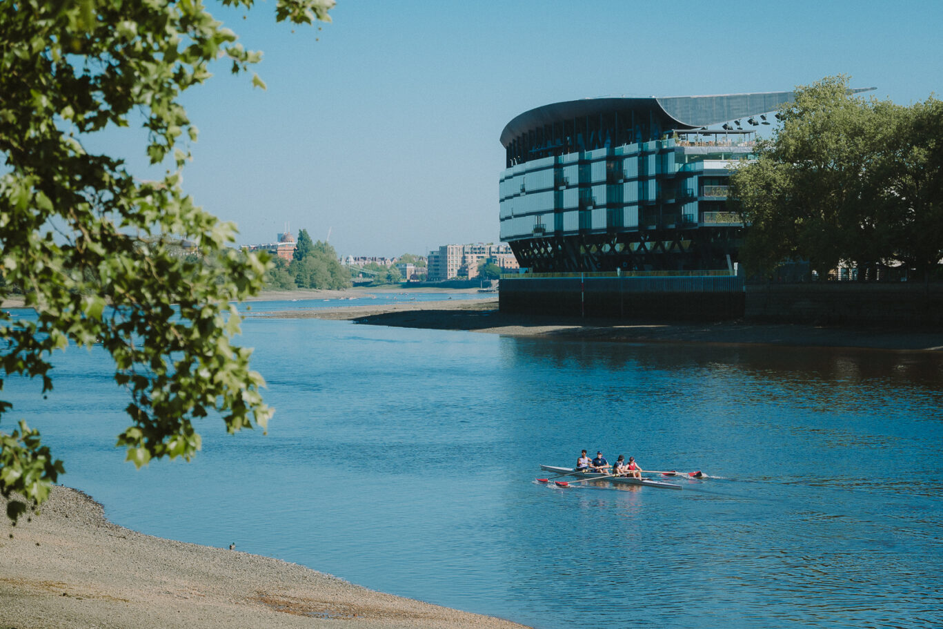 rowing in front of fulham pier