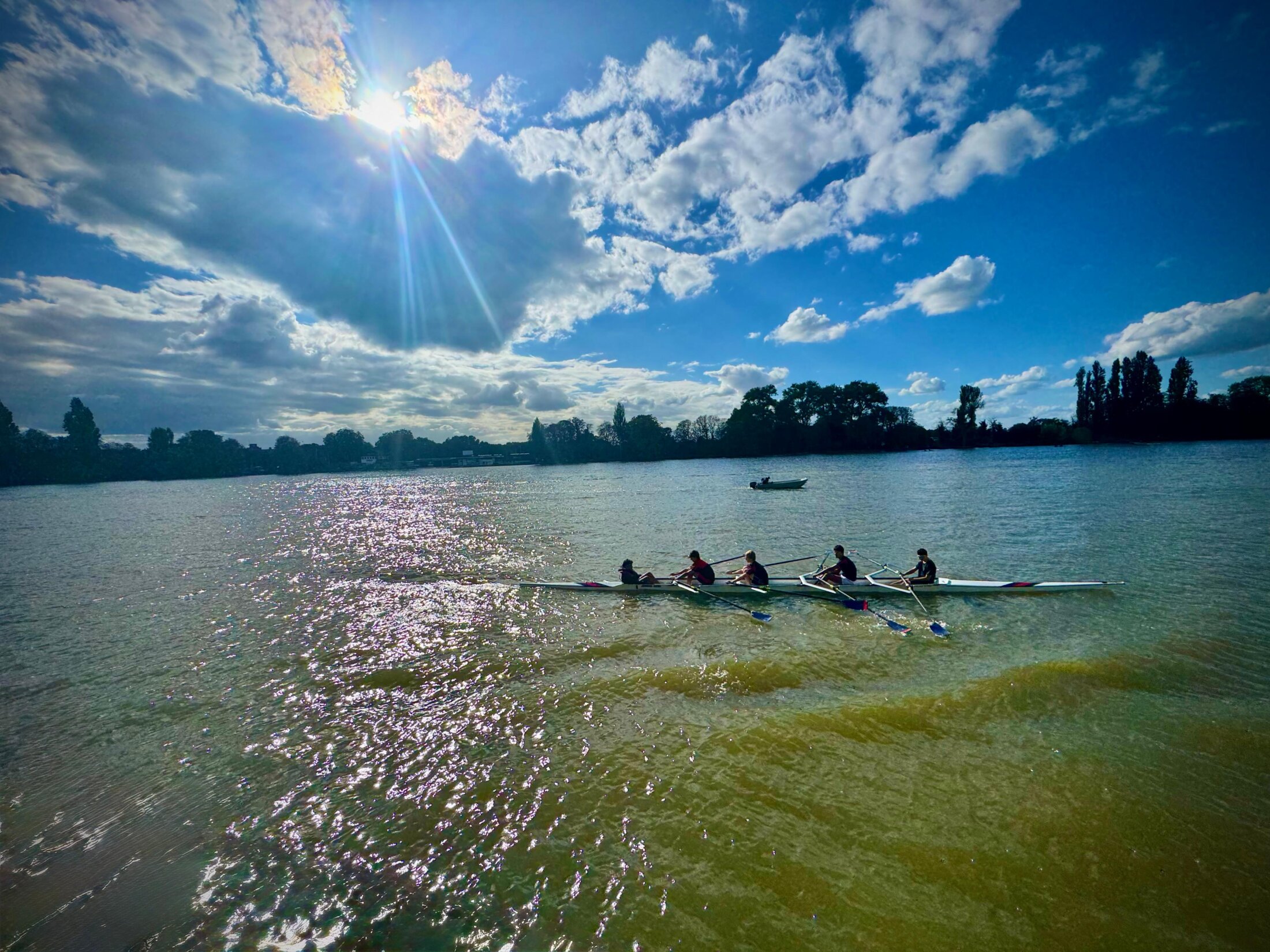 people rowing on the river thames